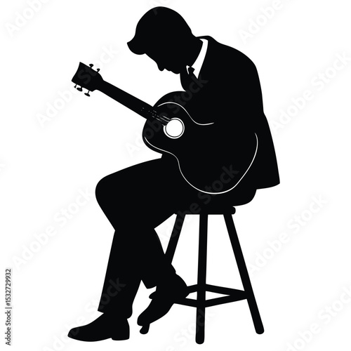 Silhouette of a Musician Playing Acoustic Guitar