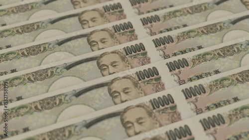 Japan yen money bank note row paper value exchange rate debt investment fund value saving cash interest inflation appreciation rise or depreciation concept.
