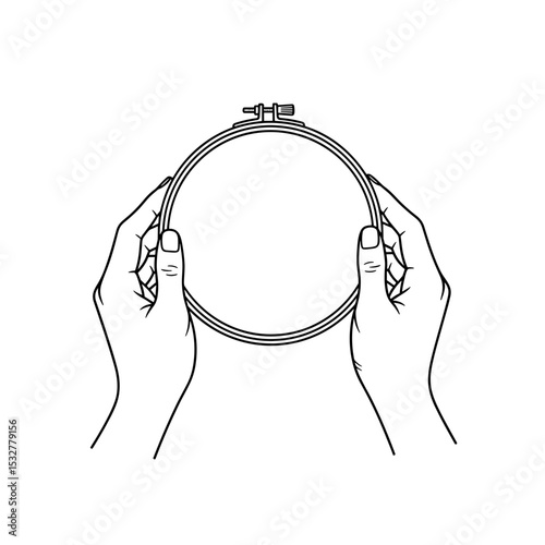 Hands holding an empty embroidery hoop, ready for crafting and creativity copy space