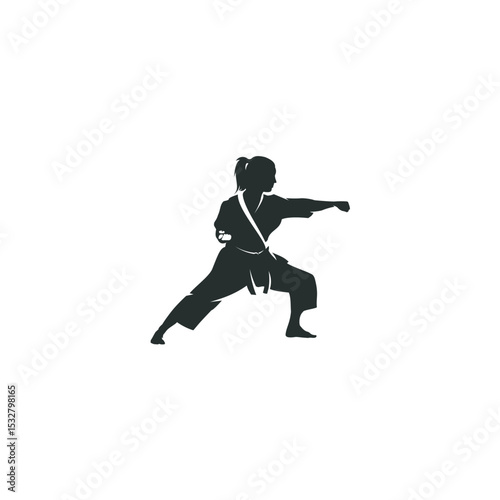 Female karate fighter silhouette performing punching stance martial arts practice and training