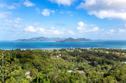 Island Praslin seen from Island La Digue, Republic of Seychelles, Africa.