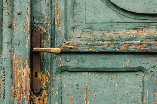 Old mint green door detail with handle photo