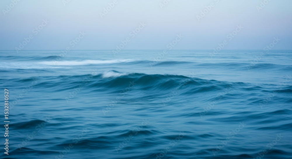 Fototapeta premium Ocean waves at dawn, soft, hazy light