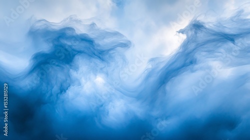 Vibrant blue abstract cloud formation with billowing and twisting textures against sky