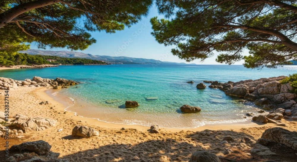 Fototapeta premium Secluded cove with crystal-clear turquoise water, sandy beach, and pine trees overhead