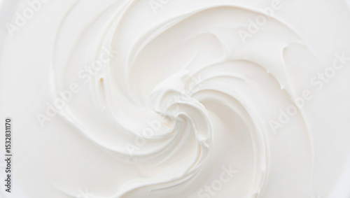 Fotografie Swirl of Smooth White Creamy Frosting or Yogurt Close Up Texture