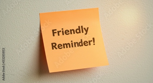 Orange sticky note on a wall, displaying a friendly reminder message