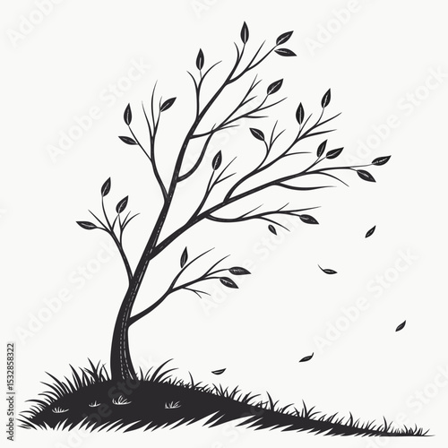 Silhouette of a windy autumn tree
