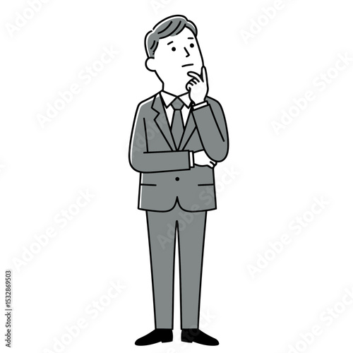 A man in a suit standing in a thoughtful pose