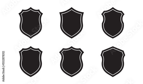 Set of shield silhouettes in various shapes and styles suitable for emblem designs and protective graphic elements