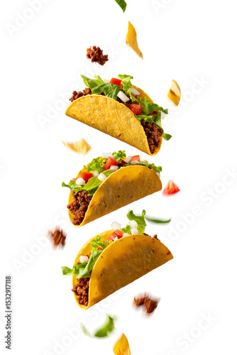 fried beef tacos with vegetables on a white background