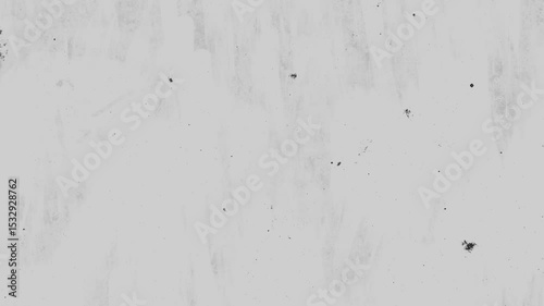Black splatter paint shape growing on a grey background. Spilled and splashed monochrome old paper background grunge texture abstract ink paint splatter and stains brushes