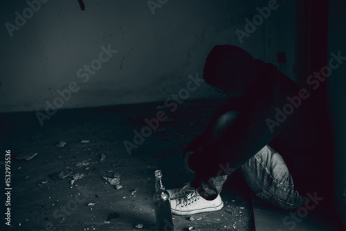 Asian men are drug addicts to inject heroin into their veins themselves,Thailand no to drug concept,The bad guy drugs in the desolate,Trapped in darkness and consumed by addiction photo