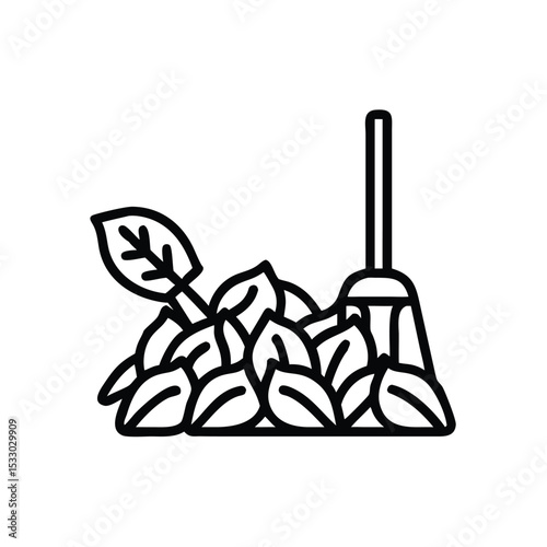 Cleaning up autumn leaves with a leaf scoop