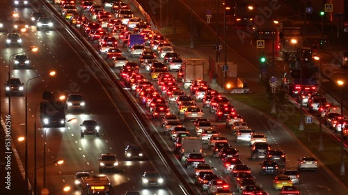 Aerial view on big traffic to center of the city at night.