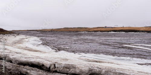 Icelandic Frozen lake with big ice cubes, Iceland, early in springtime. Icelandic Arctic landscape