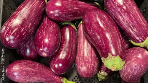 Wallpaper Mural Ripe dark eggplants in a cardboard box for sale in an elite supermarket. Healthy eating. Close-up. Torontodigital.ca