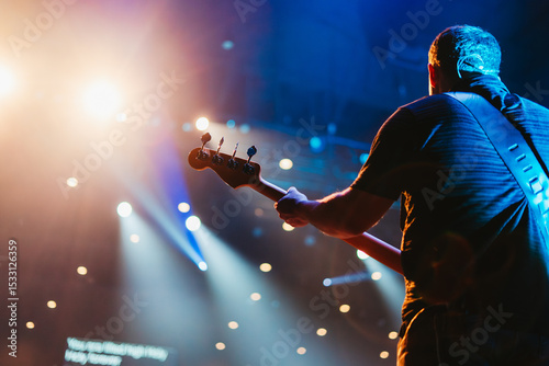 Canvas Print Bass player at a church, musician playing an instrument