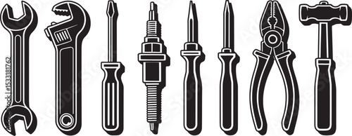 A collection of black and white hand tools representing mechanical and repair work