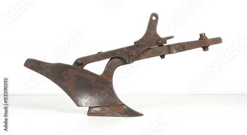 Vintage iron plow against white background