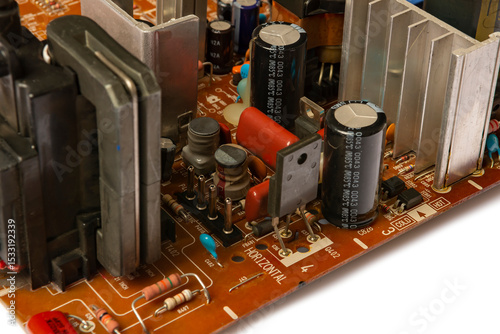 Electronic board with radio components, connectors, slots and processor chip from an electronic device, close-up