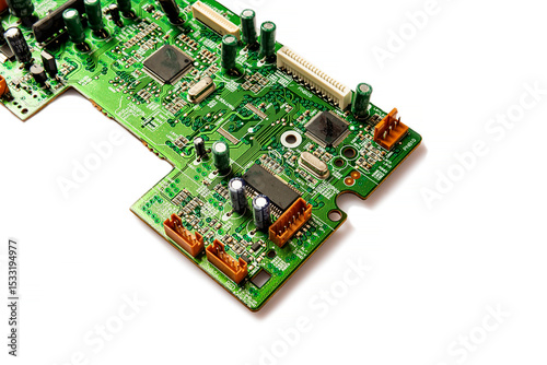 Electronic board with radio components, connectors, slots and processor chip from an electronic device, close-up top view. Copy space