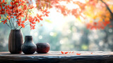 Autumnal still life with decorative vases and foliage.