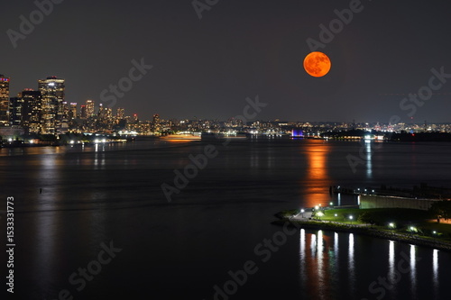 Strawberry Moon over New York Bay.