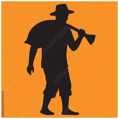 Silhouette of a farmer carrying a sack and axe on his shoulder ready for work