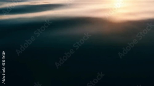 Aerial View of Deep Teal Ocean Waves with Sunlight Reflections 4k
