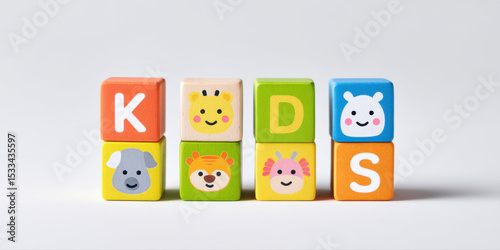 Kids toy blocks with colorful animal faces and letters K, D, S stacked in pairs, playful and bright educational wooden cubes for children