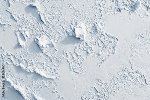 Textured light-gray surface, like cracked ice or plaster