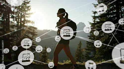 Young Woman Hiking Through Forest with Mountain View During Sunset in Active Outdoor Adventure