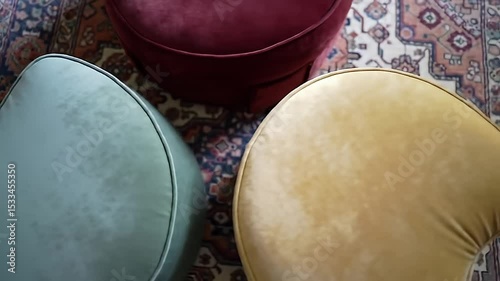 Closeup of Elegant Upholstered Chair with Velvet Texture and Decorative Rug in Cozy Living Room