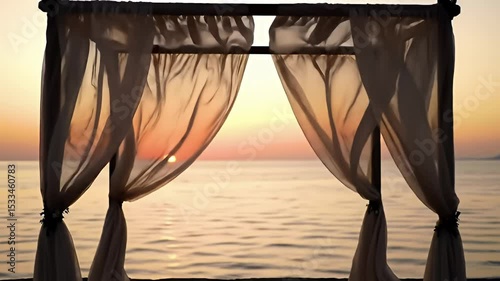 Aerial View of Luxurious Bed with Flowing Curtains Over Calm Ocean at Sunset