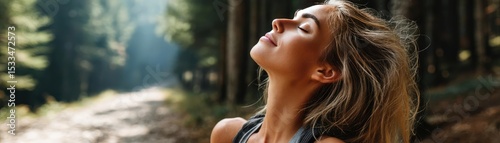 Deep breathing for wellness with focus and relaxation concept. Woman enjoying nature, feeling calm and refreshed in the forest.