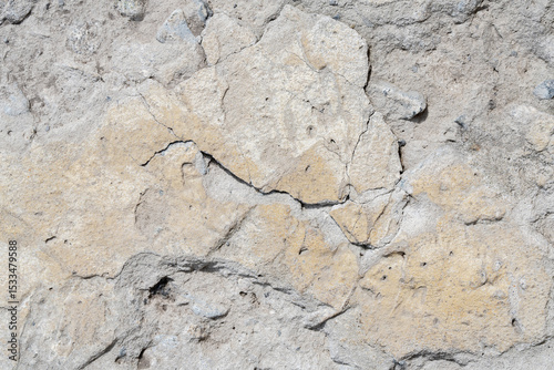 Weathered shabby cracked rock stone surface macro