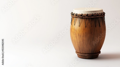 A conga drum with a smooth surface, space for text on the right, set against a bright white backdrop