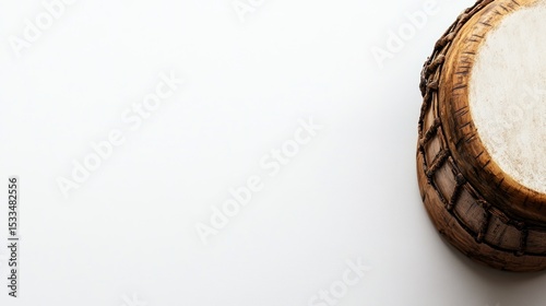 A conga drum with a smooth surface, space for text on the right, set against a bright white backdrop