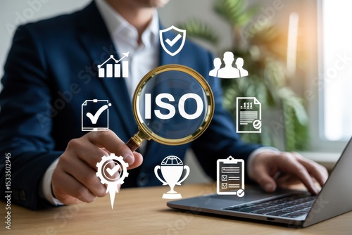 Businessman working with iso certification icons.