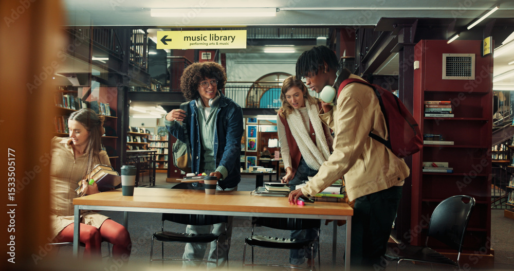 Naklejka premium Education, books and group of students studying in library for university test, project or exam. Arriving, happy and friends preparing for college assignment together with scholarship at campus.