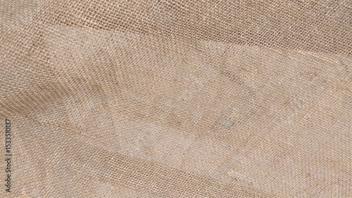 Close-up of fabric woven from burlap. Texture of natural burlap fabric for background. Hessian sack material texture, burlap cloth background