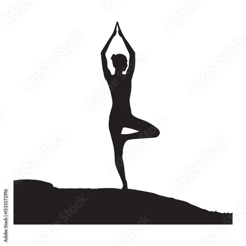 Silhouette of a woman practicing yoga tree pose near a bare tree