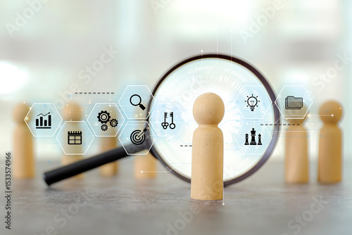 Magnifying glass search wooden person stands with HR human resources icons for personal leader training skill or leadership and challenge business team.