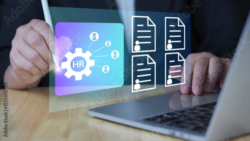 HR management online employee assessment, and professional insights, recruitment.Businessman using a tablet to manage digital profiles and performance reviews.