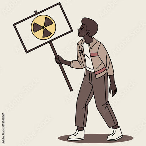 Young man holding protest sign with radiation symbol while walking  
