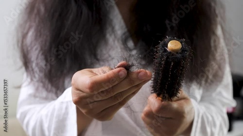 Woman with hair loss dryness and frizziness	
