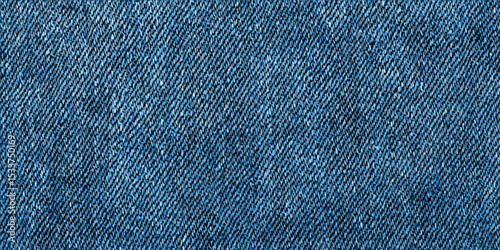 Texture of blue denim close-up. Modern high-quality material for clothes. fabric surface background