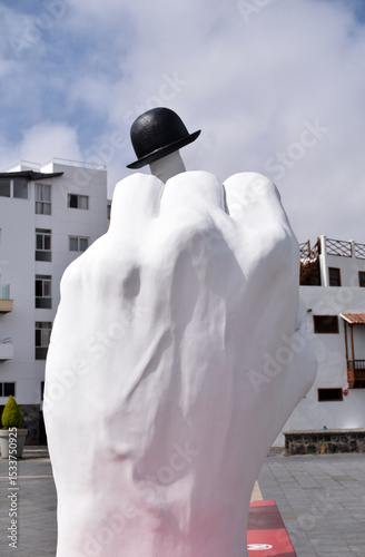 Outdoor Modern Public Sculpture of White Painted Hand and Black Bowler Hat