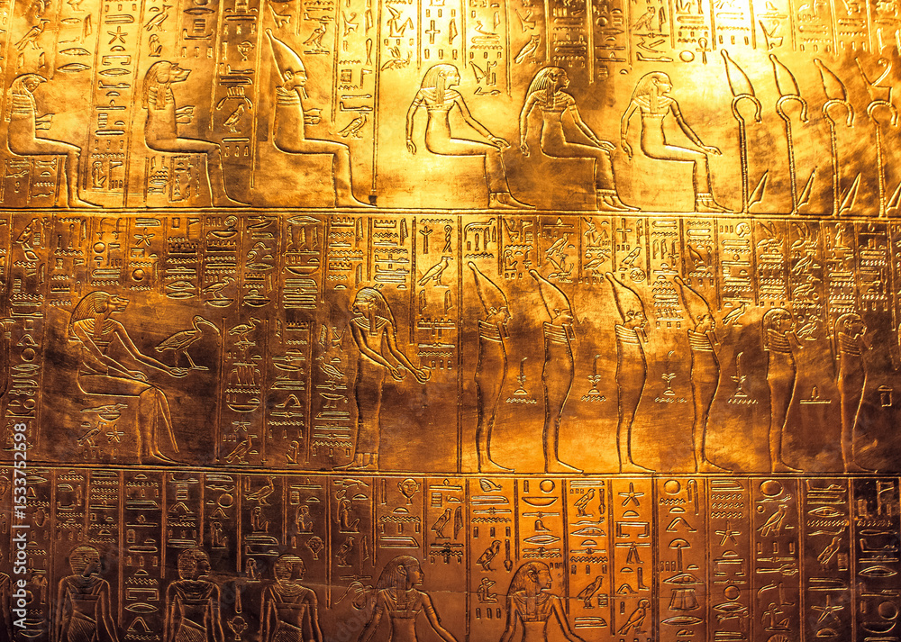 Fototapeta premium Egyptian hieroglyphics on golden plate from king Tutankhamun tomb.